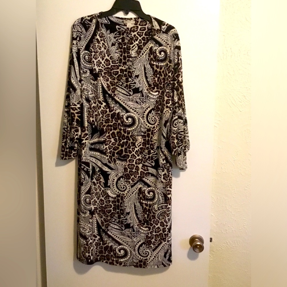 Animal print and Paisley shift dress with a V-neck and bell sleeves.